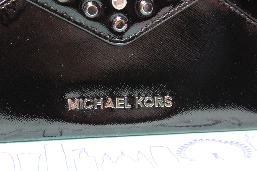 A MICHAEL KORS PATENT LEATHER CLUTCH BAG, envelope style with press stud fastening, gemset and - Image 3 of 4