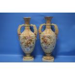 A PAIR OF TWIN HANDLED VASES, NO MARKS TO BASE