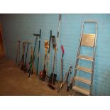 A SELECTION OF GARDEN TOOLS TO INCLUDE AN ALUMINIUM STEP LADDER AND A PICK AXE.