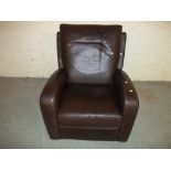 A BROWN LEATHER MANUAL RECLINER CHAIR.