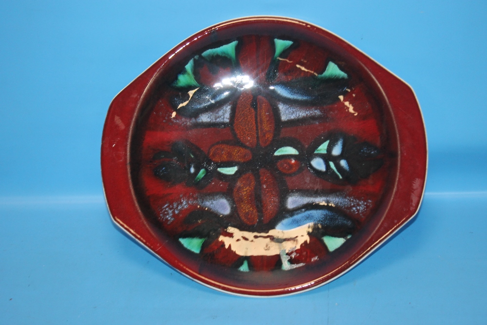 A POOLE POTTERY ART CHARGER