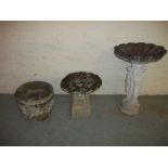 THREE CONCRETE GARDEN ORNAMENTS TO INCLUDE A GARDEN STATUE BIRD BATH, A MUSHROOM AND A PLANTER.