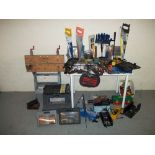 A SELECTION OF TOOLS TO INCLUDE A WORKMAT, STORAGE STEPS, SAWS AND A SCREWDRIVER SET.