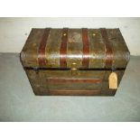 A STEEL COVERED 1950S TRAVEL TRUNK