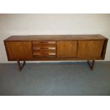 A VINTAGE RETRO TEAK SIDEBOARD.