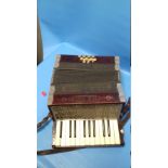 A VINTAGE PIANO ACCORDIAN 'THE MAJESTIC'
