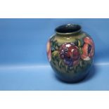 A MOORCROFT ANEMONE VASE GREEN PAINTED SIGNATURE MARK ALONGSIDE IMPRESSED FACTORY MARKS, APPROX.