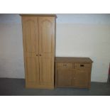 A MODERN TWO DOOR WARDROBE AND AN OAK SIDEBOARD