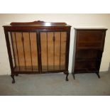 A MAHOGANY CHINA CABINET AND AN OAK NARROW WRITING BUREAU.