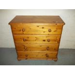 TWO SOLID PINE CHESTS OF DRAWERS A FOUR DRAWER CHEST AND A TWO OVER THREE DRAWER CHEST.