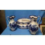A LARGE BLUE & WHITE FOOT BATH TOGETHER WITH A COPELAND JUG AND ANOTHER