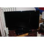 A 44" LG FLATSCREEN TV