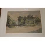 A FRAMED AND GLAZED WATERCOLOUR OF A COTTAGE SCENE SIGNED F.I. NAYLOR