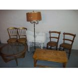 EIGHT ITEMS TO INCLUDE: AN OAK COFFEE TABLE CHAIRS, A LOOM BABIES CRIB, A BRASS LAMP ETC.