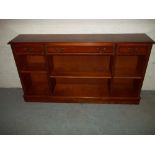 A YEW LOW WIDE BOOKCASE