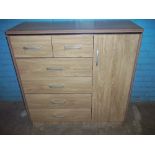 A MODERN OAK EFFECT COMBINATION TALLBOY WARDROBE UNIT WITH HANGING SPACE AND SIX DRAWERS