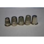 FIVE SILVER THIMBLES