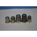 FIVE SILVER THIMBLES