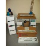 A BOXED BROTHER KNITTING MACHINE WITH WOOL DESK, STORAGE UNIT AND ACCESSORIES