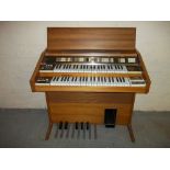 A PHILIPS PHILICORDA TEAK ORGAN.