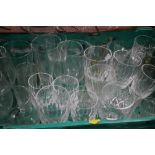 A TRAY OF DRINKING GLASSES (TRAY NOT INCLUDED)