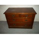 A MAHOGANY EARLY 1900S TWO OVER TWO CHEST OF DRAWERS.