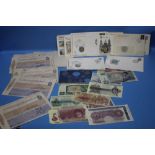 A COLLECTION OF BANK NOTES, CHEQUES, COINS ETC. TO INCLUDE NOVELTY LAUREL & HARDY 10/-