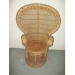 A VINTAGE WICKER PEACOCK FAN CHAIR