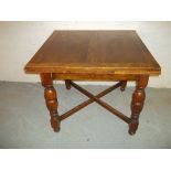 AN OAK DRAWLEAF TABLE