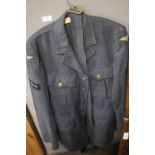 AN RAF TUNIC WITH KING CROWN BUTTONS