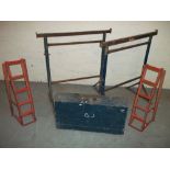 A CARPENTERS TOOL BOX TO INCLUDE CONTENTS AND TWO CAR RAMPS AND TWO STEEL ADJUSTABLE TRESTLES.