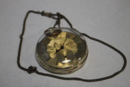 A YELLOW METAL GENTLEMAN'S OPEN FACE KEY WIND POCKET WATCH, gilt dial engraved with a scene of