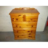 TWO OVER THREE FIVE DRAWER SOLID PINE CHEST OF DRAWERS.