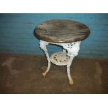 AN ANTIQUE BRTTANIA CAST IRON PUB TABLE BY GASKELL & CHAMBERS LTD.