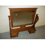 A DRESSING TABLE SWIVEL MIRROR WITH DRAWERS, IN OAK