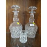 A PAIR OF CUT GLASS DECANTERS
