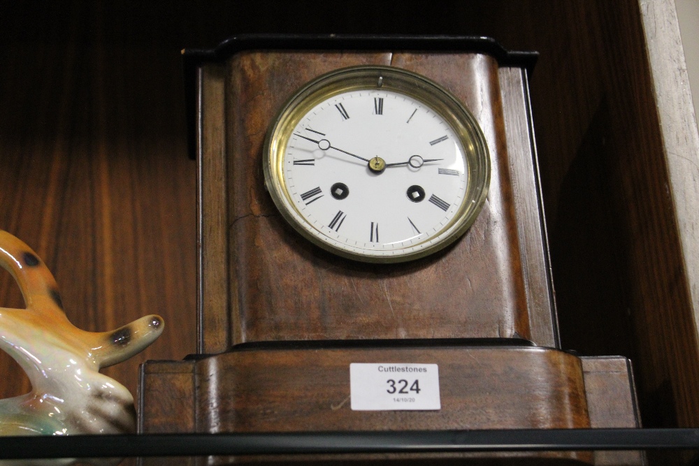 A VINTAGE MAHOGANY FRENCH BELL STRIKING MANTEL CLOCK