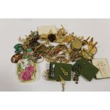 A BOX OF YELLOW METAL COSTUME JEWELLERY ETC.