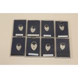 EIGHT SILVER HEART PADLOCKS