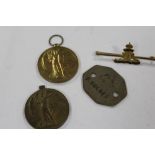 TWO WWI MEDALS, TOGETHER WITH A DOG TAG AND A MILITARY BROOCH