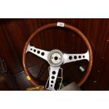 A VINTAGE WOODEN CAR STEERING WHEEL, STAMPED 'LL'