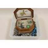A TUB OF COSTUME JEWELLERY TO INCLUDE SILVER EXAMPLES, MARCASITE EAGLE BROOCH ETC.