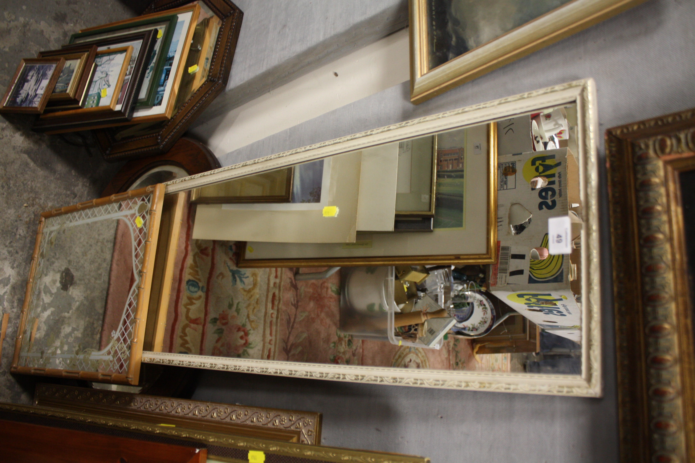 AN OAK FRAMED OVAL WALL MIRROR TOGETHER WITH A PINE FRAMED RECTANGULAR WALL MIRROR AND TWO OTHERS (