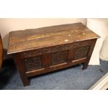 AN ANTIQUE CARVED OAK COFFER W-120 CM