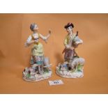 A PAIR OF VINTAGE CERAMIC FIGURES WITH CROSSED SWORD BACK STAMPS