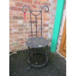 A CAST METAL GOTHIC STYLE CHAIR