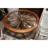 A RETRO SHIPS WHEEL GLASS COFFEE TABLE DIA. 76CM