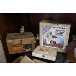 A BOXED HANIMEX SLIDE PROJECTOR, A BOXED DUSTETTE HOOVER, VINTAGE FIRST AID KIT ETC.