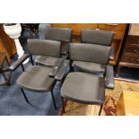 A SET OF FOUR RETRO STYLE OFFICE ARMCHAIRS
