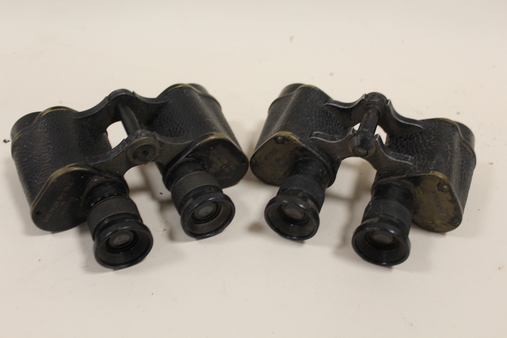 TWO PAIRS OF MILITARY STYLE BINOCULARS ONE BY WRAY OF LONDON, THE OTHER BY AKERSHAW & SON OF LEEDS